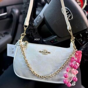 Coach Cream Shoulder Bag with Gold Chain and Pink Charm